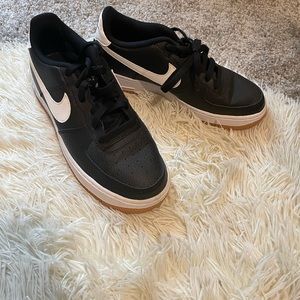 Black and white nike air force ones